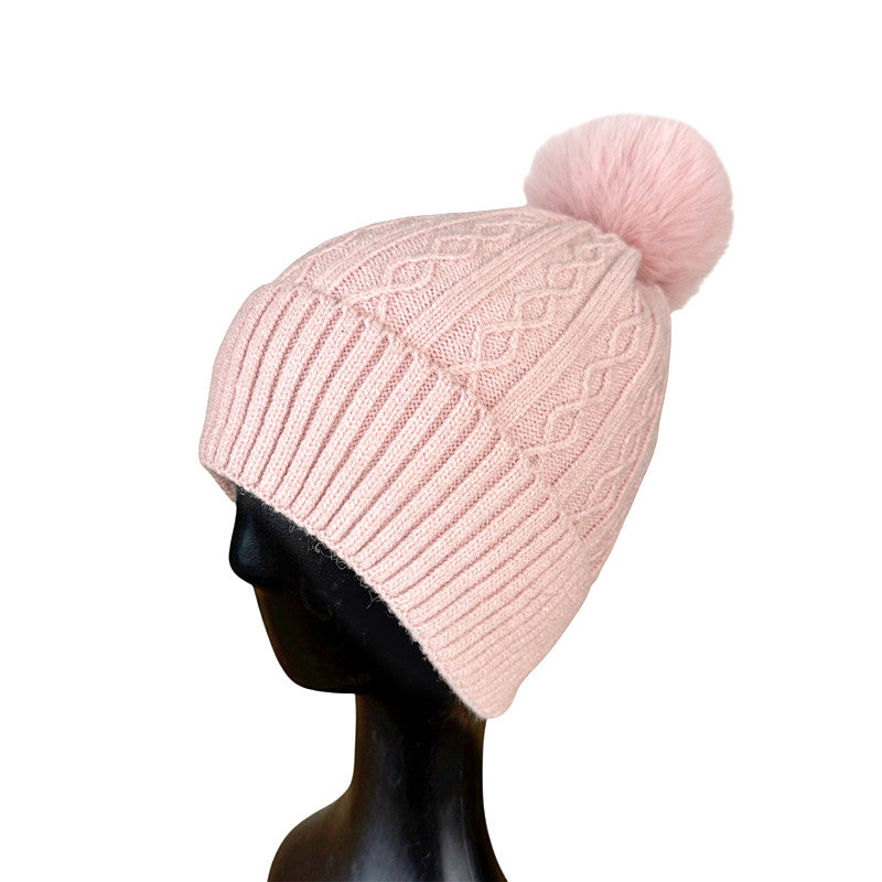 Beanie with pompom and fleece lining