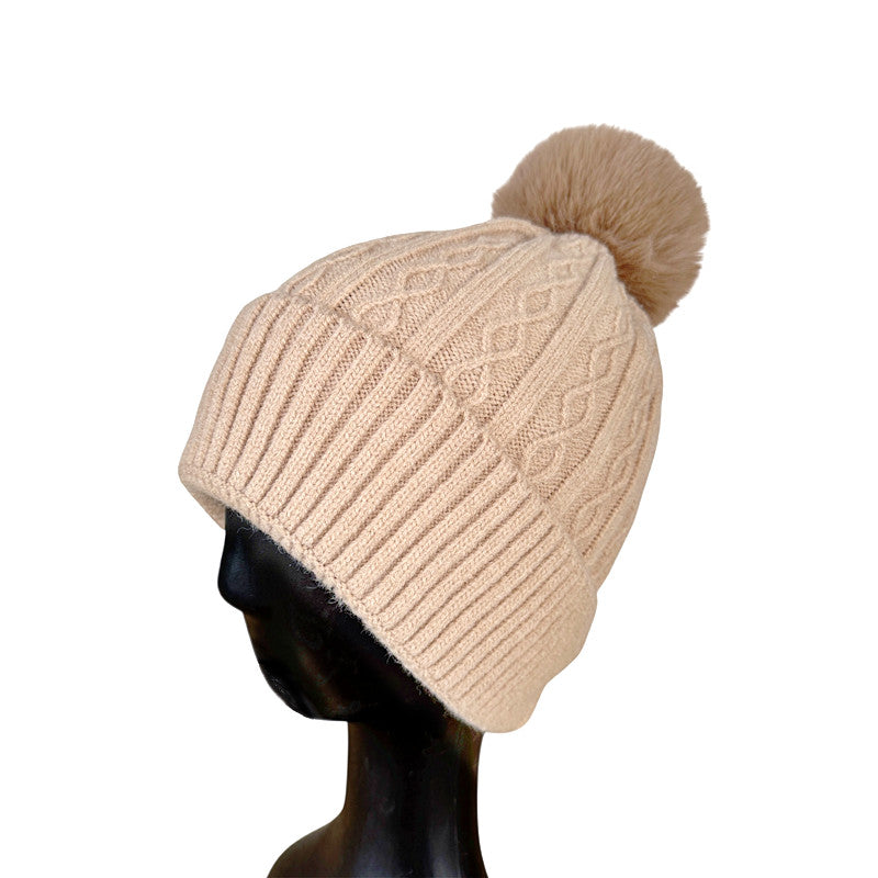 Beanie with pompom and fleece lining